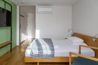 Ein Bett oder Betten in einem Zimmer der Unterkunft Hotel Schloss Hernstein
