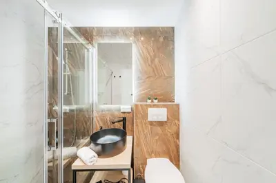 Ein Badezimmer in der Unterkunft Zeus Design Apartmenthaus