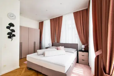 Ein Bett oder Betten in einem Zimmer der Unterkunft Royal Residences Vienna
