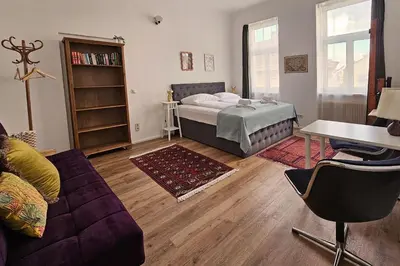 Ein Bett oder Betten in einem Zimmer der Unterkunft Vienna Palm Apartments