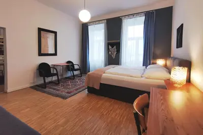 Ein Bett oder Betten in einem Zimmer der Unterkunft Vienna Palm Apartments