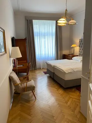 Ein Bett oder Betten in einem Zimmer der Unterkunft Boutique Hotel Nossek