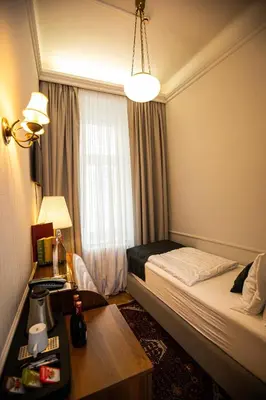 Ein Bett oder Betten in einem Zimmer der Unterkunft Boutique Hotel Nossek