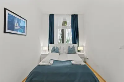 Ein Bett oder Betten in einem Zimmer der Unterkunft 1 Bedroom Garden Apartment near Schönbrunn