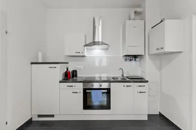 Küche/Küchenzeile in der Unterkunft 1 Bedroom Garden Apartment near Schönbrunn