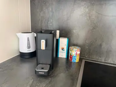 Kaffee-/Teezubehör in der Unterkunft Urban Oasis: Stylische Wohnung
