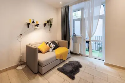 Ein Sitzbereich in der Unterkunft Cozy Market-Square retreat located in the heart of the 10th district