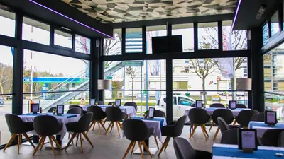 Ein Restaurant oder anderes Speiselokal in der Unterkunft Primus Hotel & Apartments