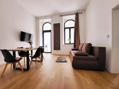 Ein Sitzbereich in der Unterkunft Novara City Apartment