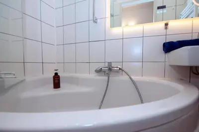 Ein Badezimmer in der Unterkunft Home Suites Home