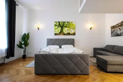 Ein Sitzbereich in der Unterkunft Apartments 4 you Red Star 8