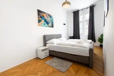 Ein Bett oder Betten in einem Zimmer der Unterkunft Apartments 4 you Red Star 8