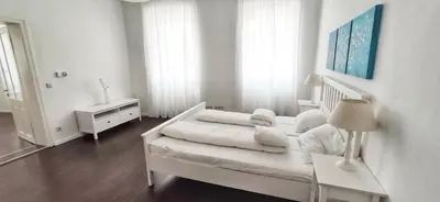 Ein Bett oder Betten in einem Zimmer der Unterkunft Helle Zweiraumwohnung in Wohngebiet