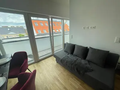 Ein Sitzbereich in der Unterkunft Swan Stay Property 17