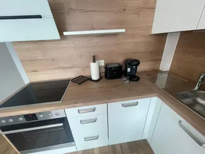 Küche/Küchenzeile in der Unterkunft Swan Stay Property 17