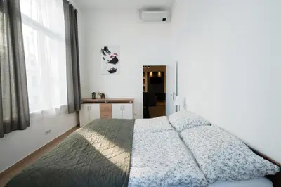 Ein Bett oder Betten in einem Zimmer der Unterkunft New Favoriten - Serviced Apartments