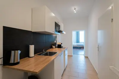 Küche/Küchenzeile in der Unterkunft New Favoriten - Serviced Apartments