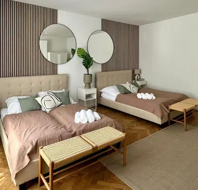 Ein Bett oder Betten in einem Zimmer der Unterkunft Designer Apartment Near Main Station