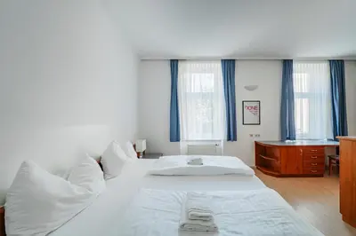 Ein Bett oder Betten in einem Zimmer der Unterkunft 74 Living Apartments