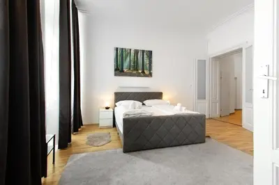 Ein Bett oder Betten in einem Zimmer der Unterkunft Apartments 4 you