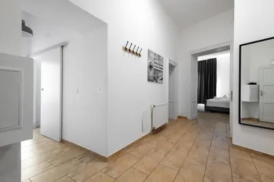 Ein Bett oder Betten in einem Zimmer der Unterkunft Apartments 4 you