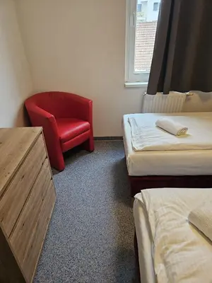 Ein Bett oder Betten in einem Zimmer der Unterkunft Hotel Astral Vienna