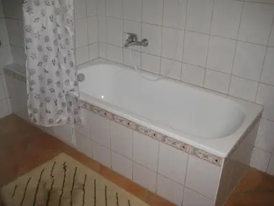 Ein Badezimmer in der Unterkunft HappyHostel