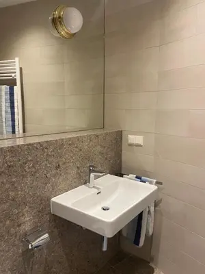Ein Badezimmer in der Unterkunft Klimtsuites