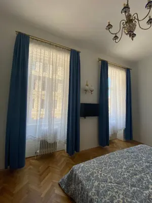 Ein Bett oder Betten in einem Zimmer der Unterkunft Klimtsuites