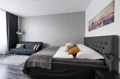 Ein Bett oder Betten in einem Zimmer der Unterkunft Gemütliches App. Messe / Prater