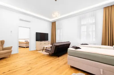 Ein Bett oder Betten in einem Zimmer der Unterkunft Lé David City Apartments 1020