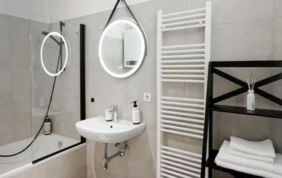 Ein Badezimmer in der Unterkunft MINIMALISTIC STUDIO NEAR NASCHMARKT