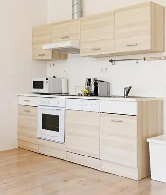Küche/Küchenzeile in der Unterkunft MINIMALISTIC STUDIO NEAR NASCHMARKT
