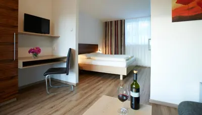 Ein Bett oder Betten in einem Zimmer der Unterkunft Gästehaus Elisabeth Weinhandl