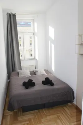 Ein Bett oder Betten in einem Zimmer der Unterkunft Schöne Eigentumswohnung im 10 bezirk