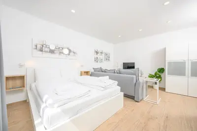 Ein Bett oder Betten in einem Zimmer der Unterkunft Hideaway Favoriten