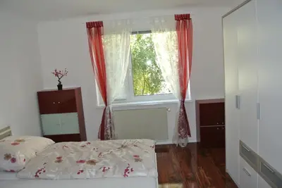 Ein Bett oder Betten in einem Zimmer der Unterkunft Apartment Paradies - U1 Station altes Landgut
