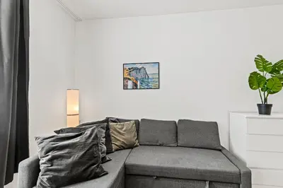 Ein Sitzbereich in der Unterkunft Cozy Apartment near City Center