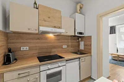 Küche/Küchenzeile in der Unterkunft Cozy Apartment near City Center