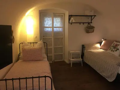 Ein Bett oder Betten in einem Zimmer der Unterkunft Ferienwohnungen Neusiedl am See