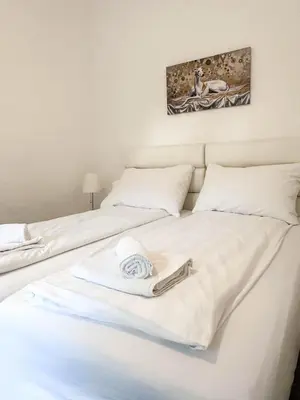Ein Bett oder Betten in einem Zimmer der Unterkunft Old Vienna Apartments