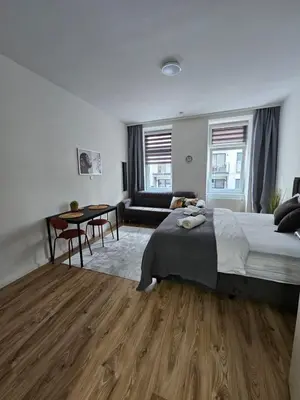 Ein Bett oder Betten in einem Zimmer der Unterkunft Cozy Core Vienna 10 min to Center