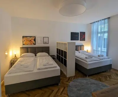 Ein Bett oder Betten in einem Zimmer der Unterkunft Big CityApartment 19