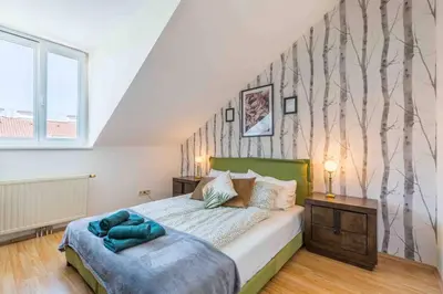 Ein Bett oder Betten in einem Zimmer der Unterkunft Modern Colonial Style, Central, Rooftop, BBQ