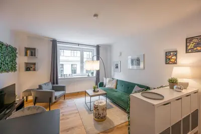 Ein Sitzbereich in der Unterkunft Modern City Center Apartment