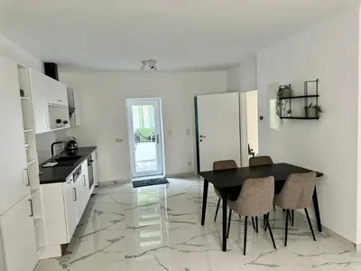 Küche/Küchenzeile in der Unterkunft Viviane Paulos Apartment - Stylish apartment at Wienerberg