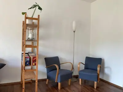 Ein Sitzbereich in der Unterkunft Wohnung im Grünen
