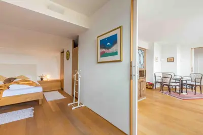 Ein Bett oder Betten in einem Zimmer der Unterkunft Whirlpool , Dachterrasse , Wienblick , zwei Etagen