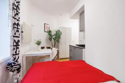 Ein Bett oder Betten in einem Zimmer der Unterkunft Modern City Apartment