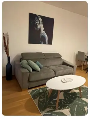 Ein Sitzbereich in der Unterkunft New Central Apartments Westbahnhof